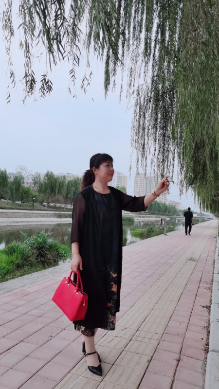 周本玲的第一张照片--德州相亲服务中心